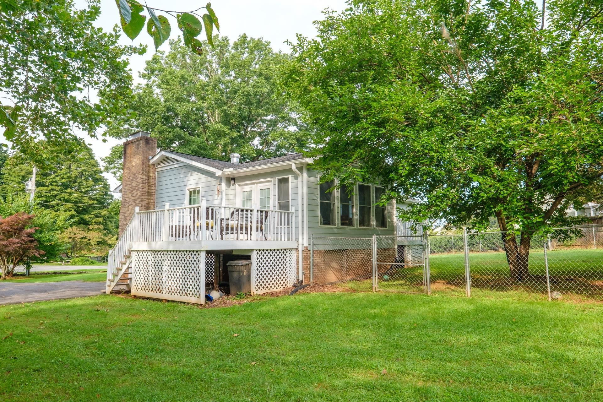 50 Valley Road Ruckersville, VA 22968 - Photo 35 of 39 a view of house with a big yard and large trees
