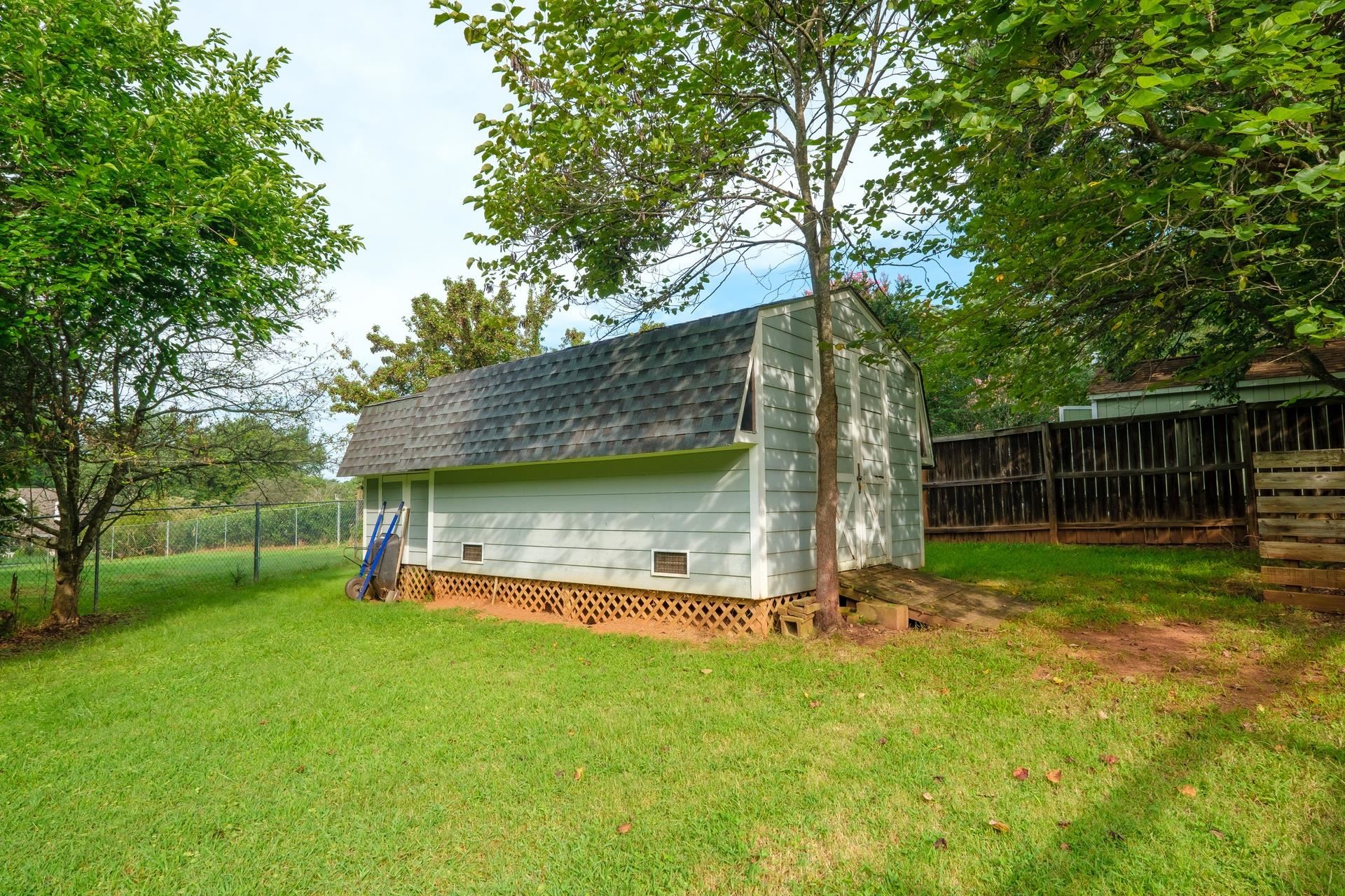 50 Valley Road Ruckersville, VA 22968 - Photo 37 of 39 a view of a tiny house with backyard