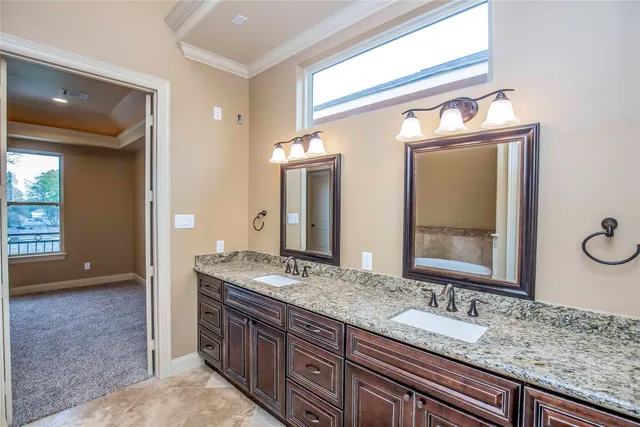 a bathroom with a bathtub and a sink