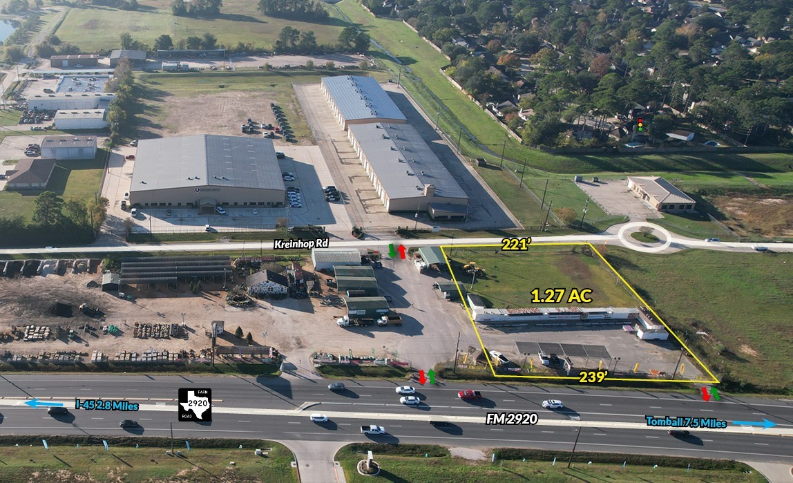 an aerial view of a house with a swimming pool