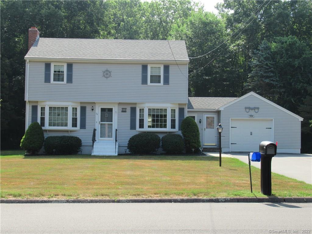 Classic Colonial with a level lot on a quiet street.