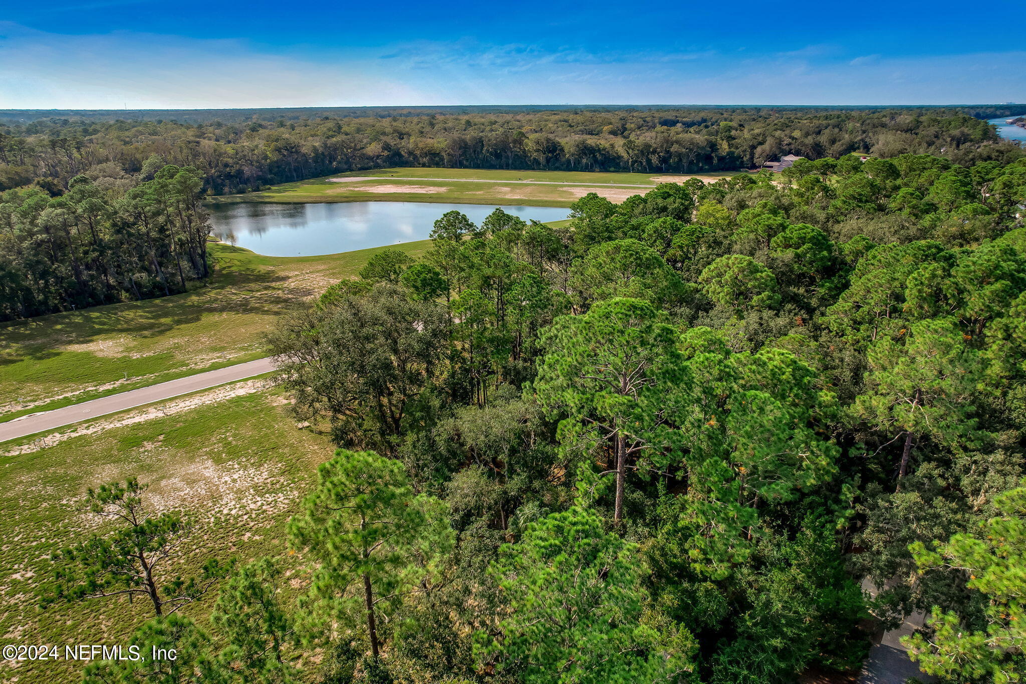 557 Shell Ridge Lane Ponte Vedra, FL 32081 - Photo 6 of 17 a view of a water pond with an outdoor space
