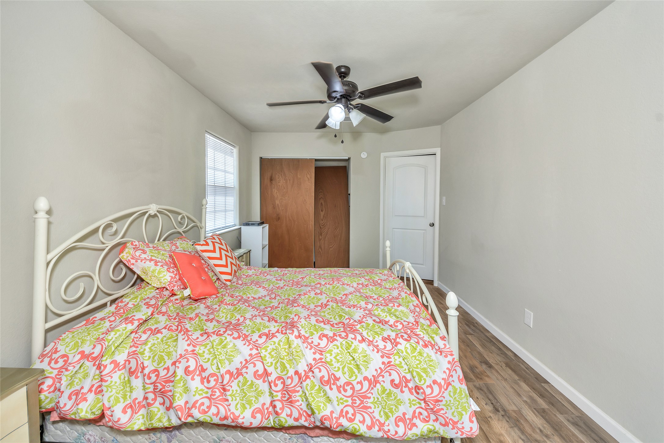 2581 County Road 156 Georgetown, TX 78626 - Photo 19 of 29 a bedroom with a bed and a chandelier