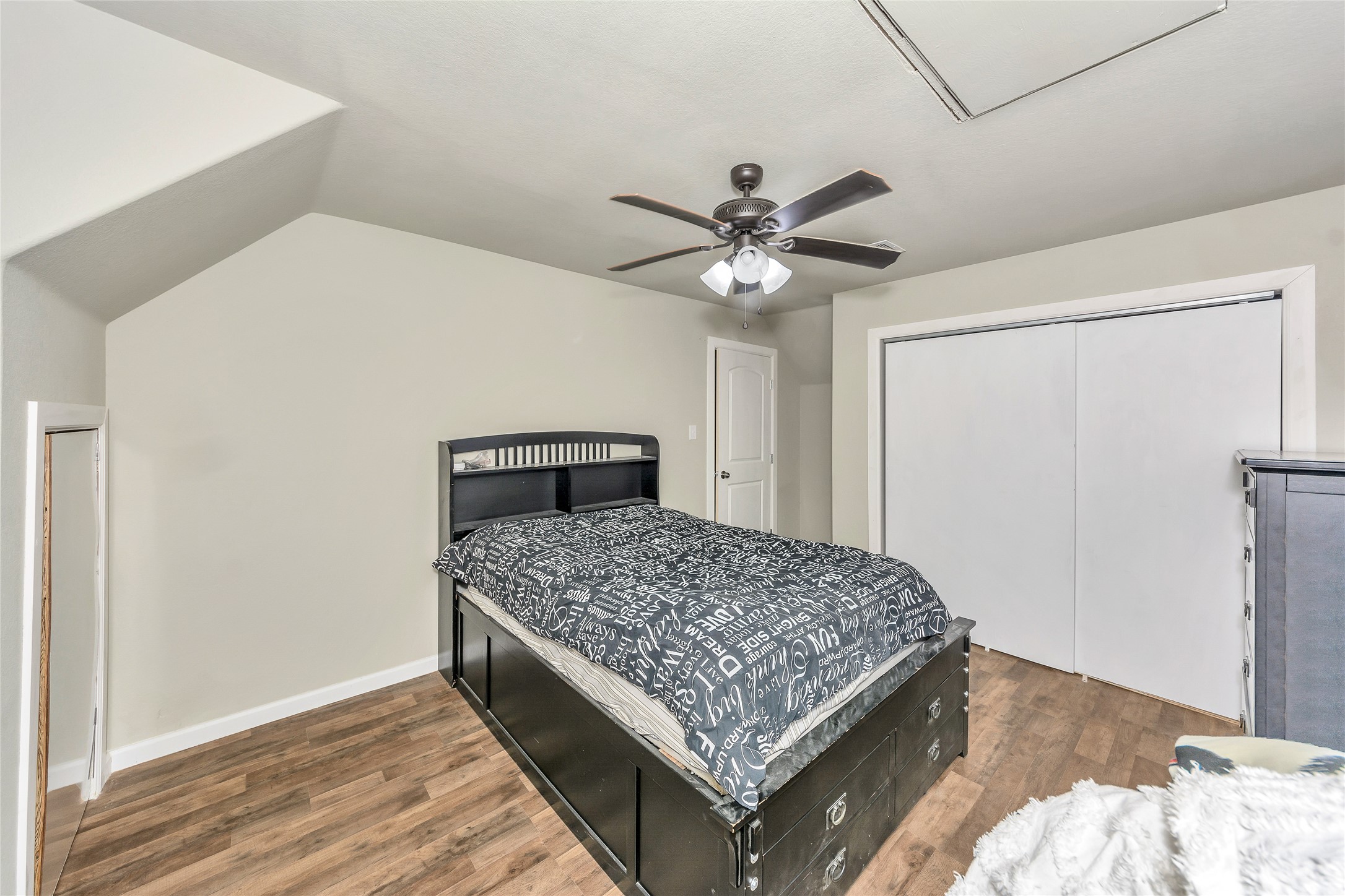 2581 County Road 156 Georgetown, TX 78626 - Photo 20 of 29 a bedroom with a bed and a chandelier