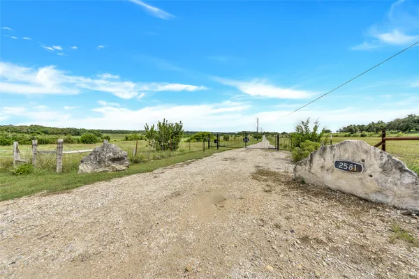 a view of a road with an outdoor space
