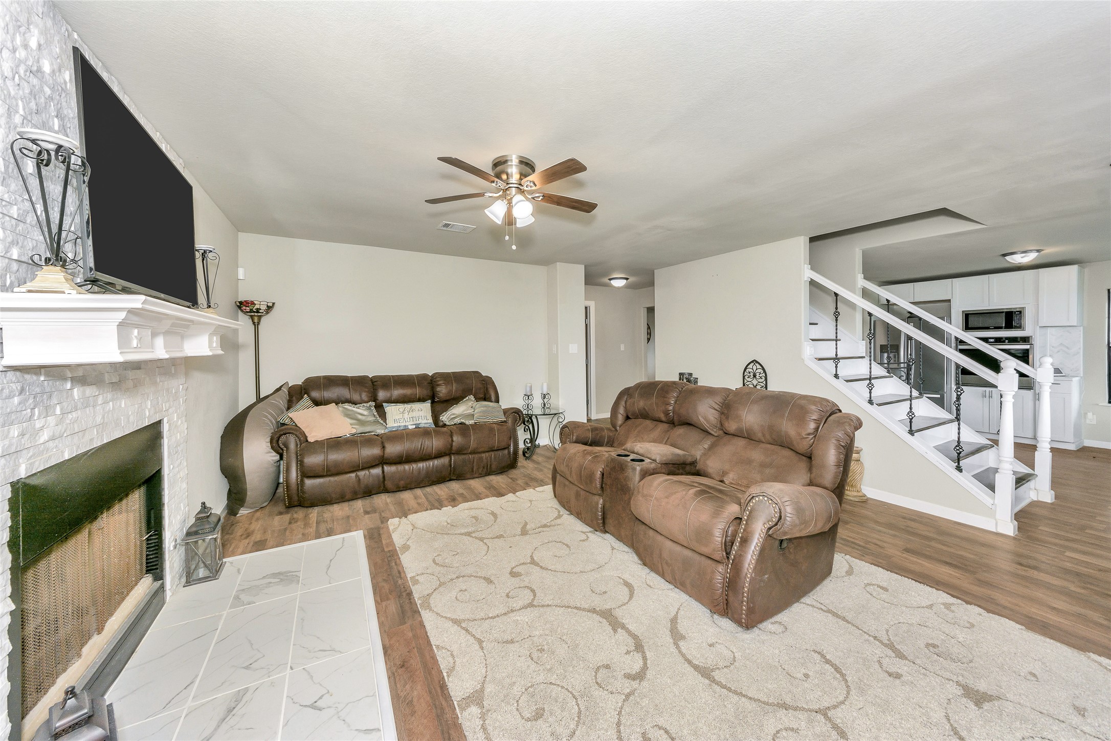 2581 County Road 156 Georgetown, TX 78626 - Photo 8 of 29 a living room with furniture and a fireplace