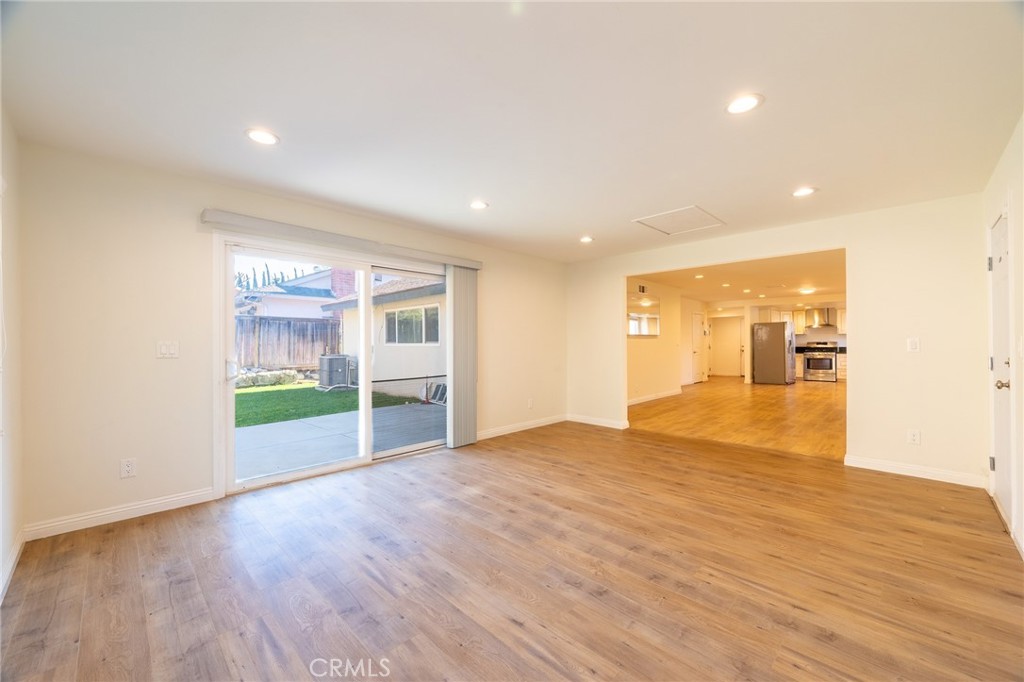 2270 Raleo Avenue Rowland Heights, CA 91748 - Photo 12 of 36 a view of an empty room with wooden floor and a window