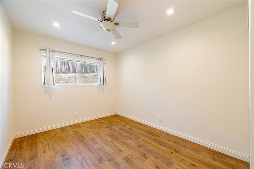 2270 Raleo Avenue Rowland Heights, CA 91748 - Photo 13 of 36 wooden floor in an empty room with a window