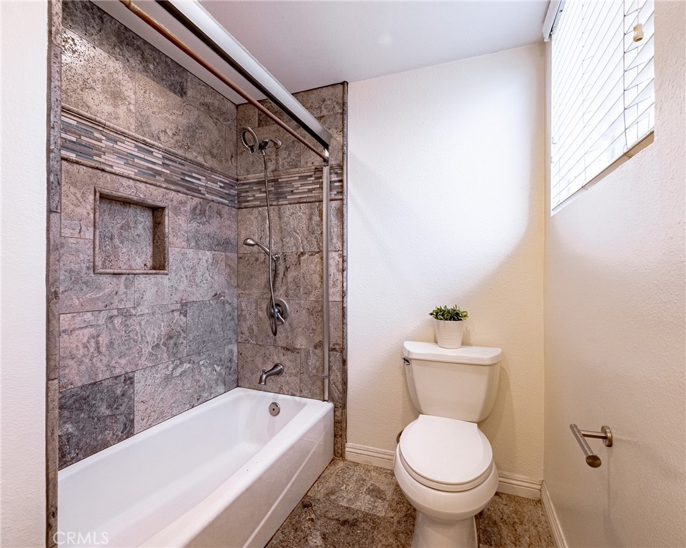 2270 Raleo Avenue Rowland Heights, CA 91748 - Photo 18 of 36 a bathroom with a toilet and a bathtub