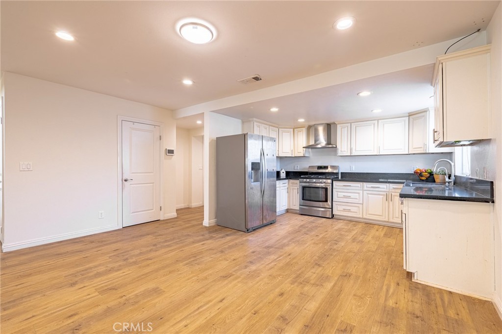 2270 Raleo Avenue Rowland Heights, CA 91748 - Photo 5 of 36 a kitchen with stainless steel appliances granite countertop a refrigerator and a sink