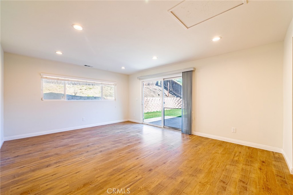 2270 Raleo Avenue Rowland Heights, CA 91748 - Photo 9 of 36 an empty room with wooden floor and windows
