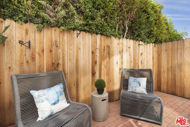 a view of wooden floor in backyard