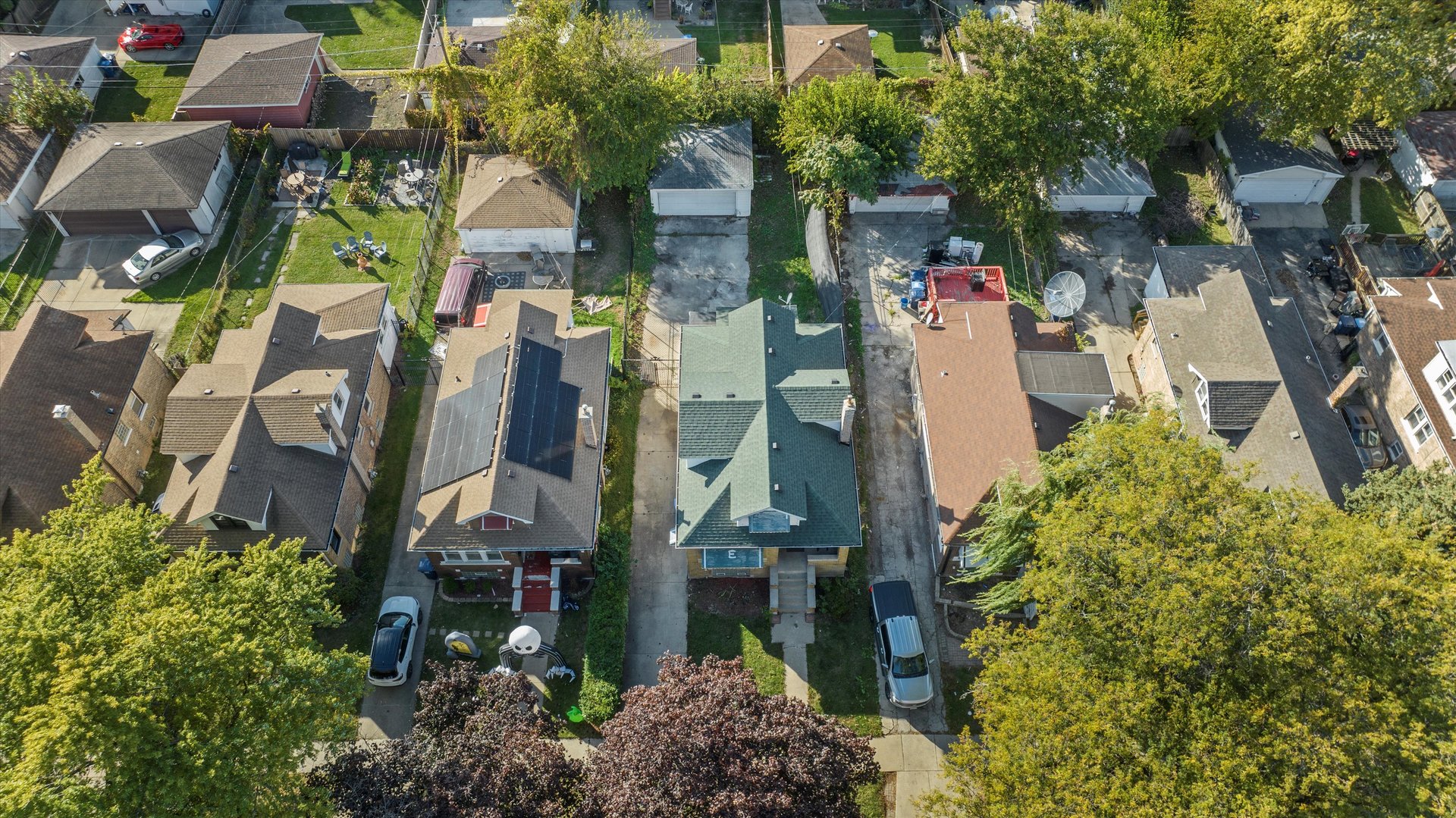 1430 South 10th Avenue Maywood, IL 60153 - Photo 21 of 29 a aerial view of multi story residential apartment building with yard and parking space