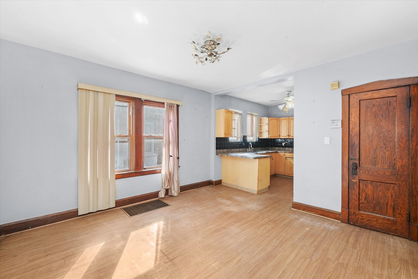 1430 South 10th Avenue Maywood, IL 60153 - Photo 6 of 29 a view of kitchen with refrigerator and window