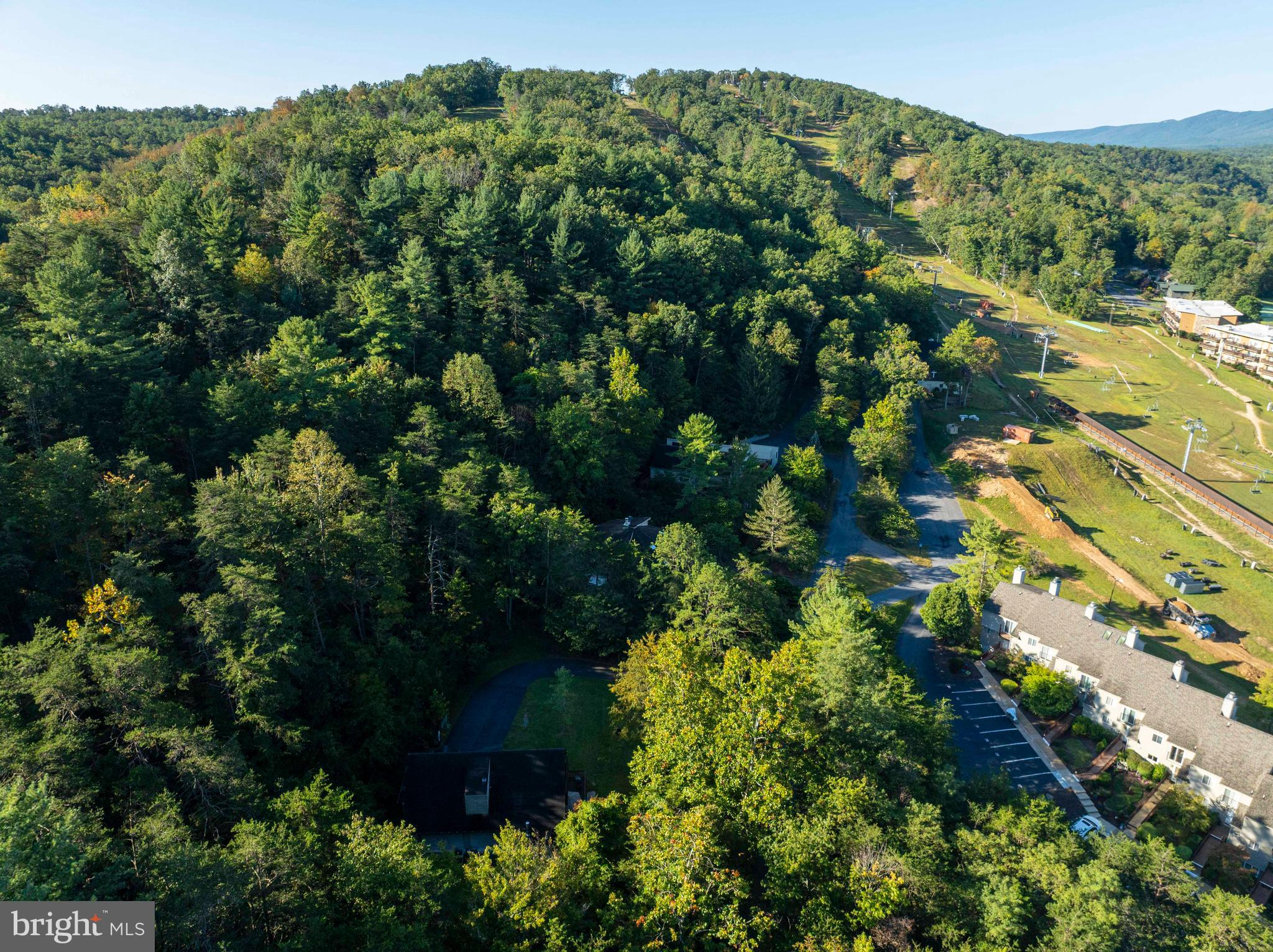 125 Fritzel Way Basye, VA 22842 - Photo 14 of 72 an aerial view of a city with lots of residential buildings