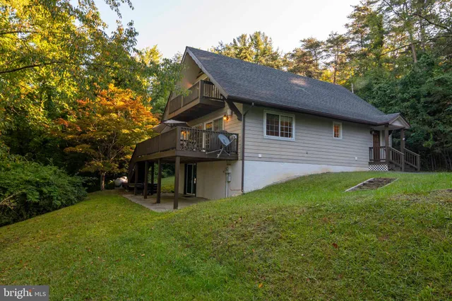 a view of kids room with a window