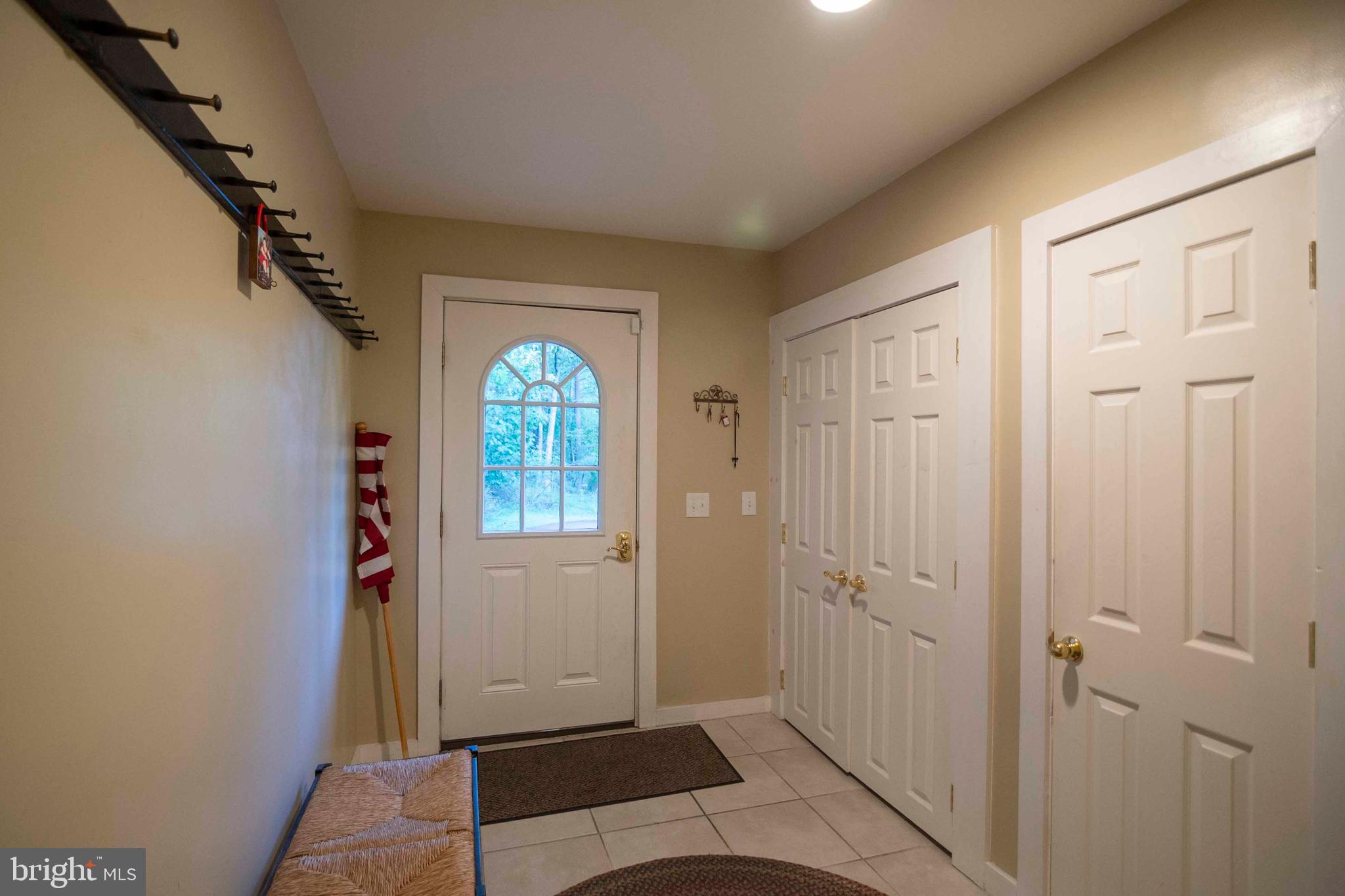 125 Fritzel Way Basye, VA 22842 - Photo 19 of 72 wooden floor in an empty room with a window