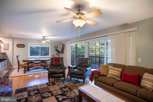 a view of balcony with wooden floor