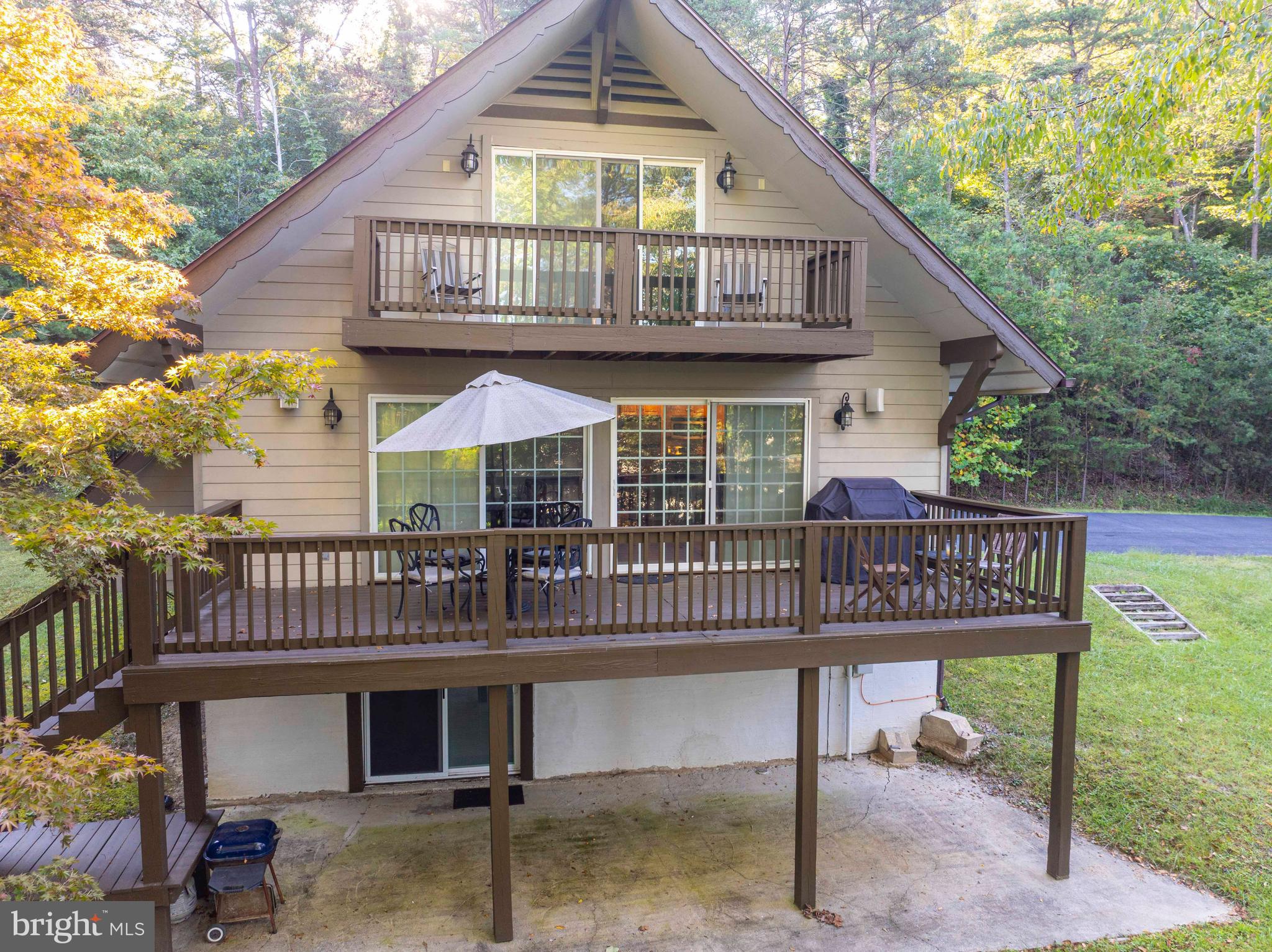 125 Fritzel Way Basye, VA 22842 - Photo 4 of 72 a view of a house with a deck