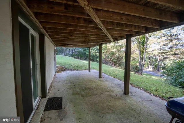 a view of a swimming pool with a lake view