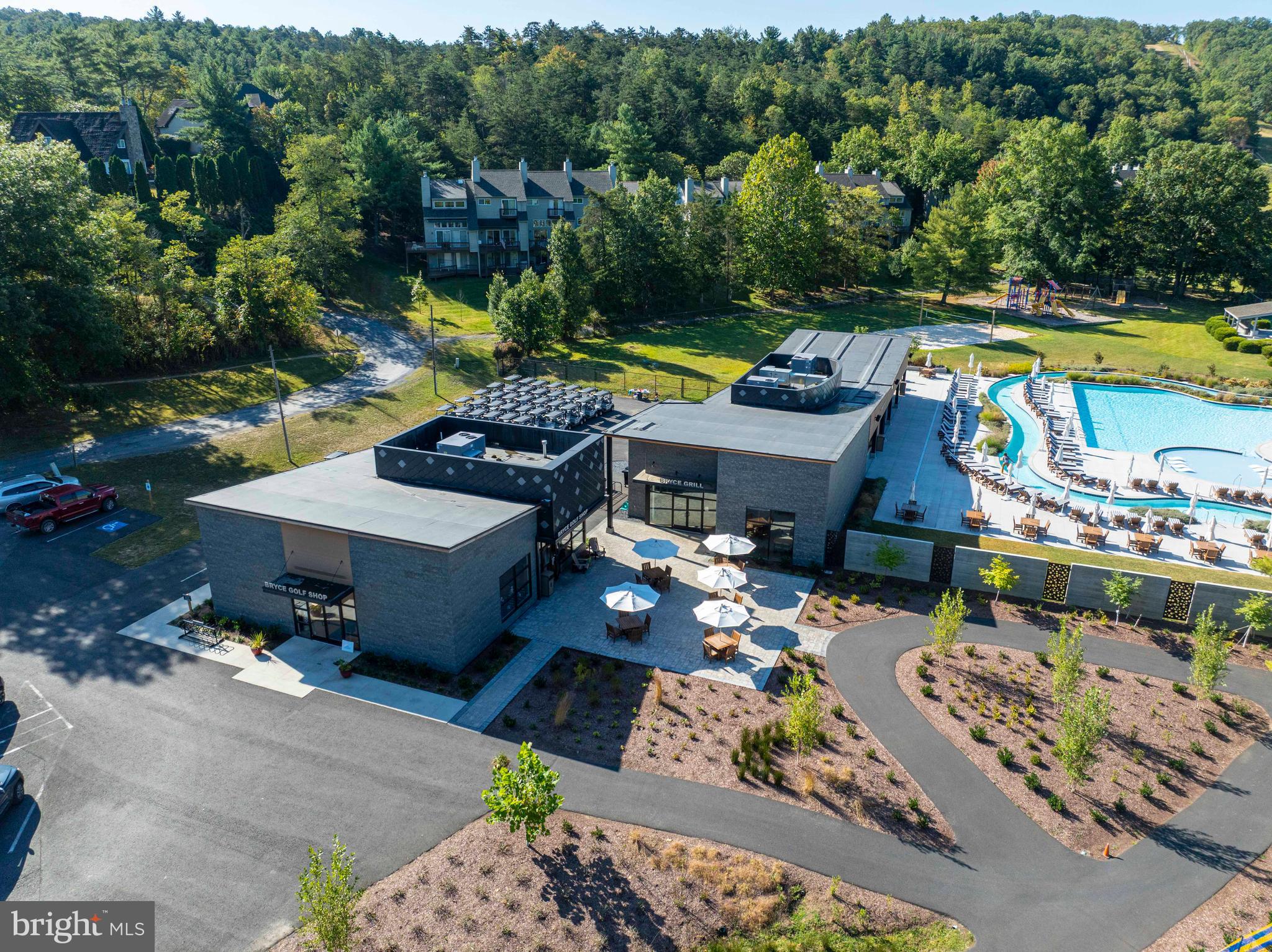 125 Fritzel Way Basye, VA 22842 - Photo 65 of 72 an aerial view of a house with a garden patio