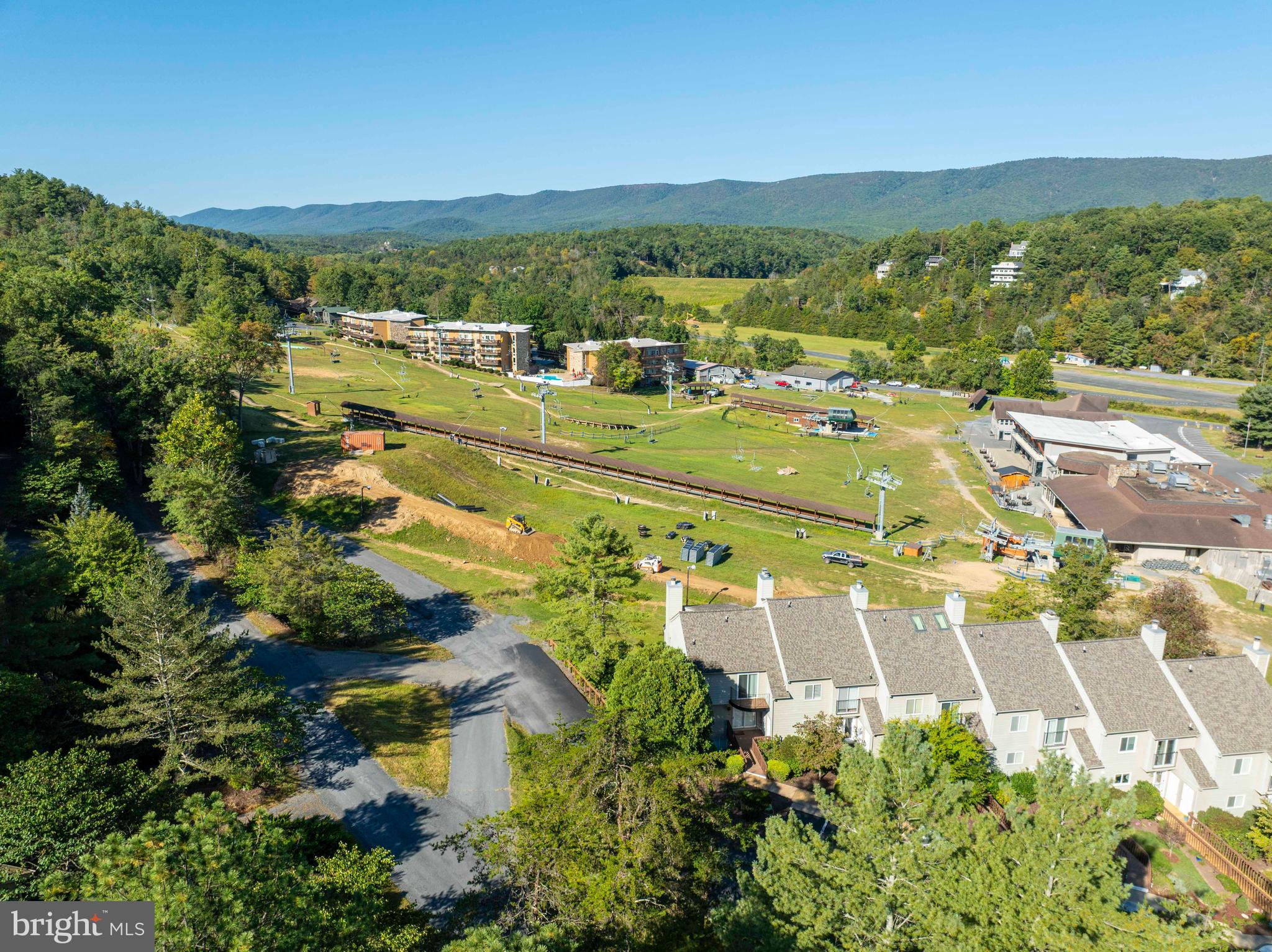 125 Fritzel Way Basye, VA 22842 - Photo 10 of 72 an aerial view of residential houses with outdoor space and swimming pool