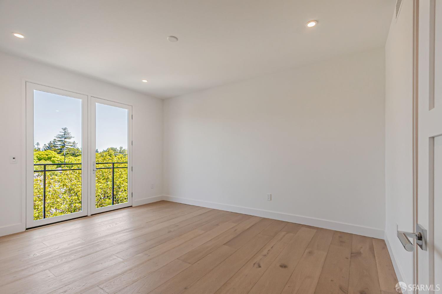 425 1st Street, Unit 36 Los Altos, CA 94022 - Photo 16 of 42 a view of room with wooden floor and window