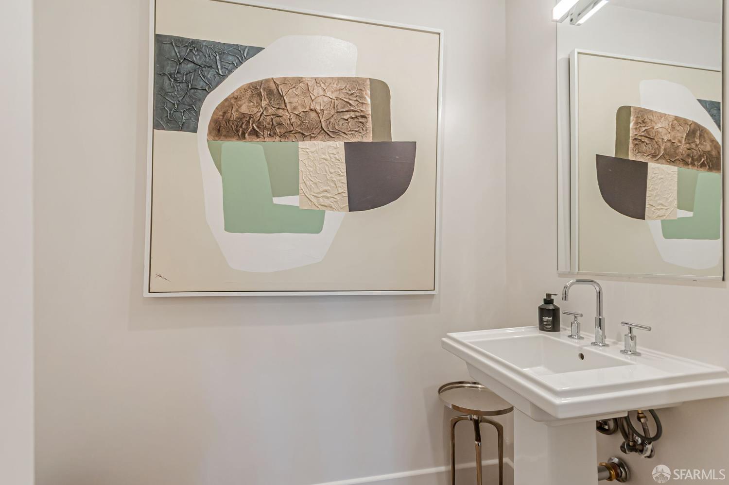 425 1st Street, Unit 36 Los Altos, CA 94022 - Photo 28 of 42 a bathroom with a sink and mirror