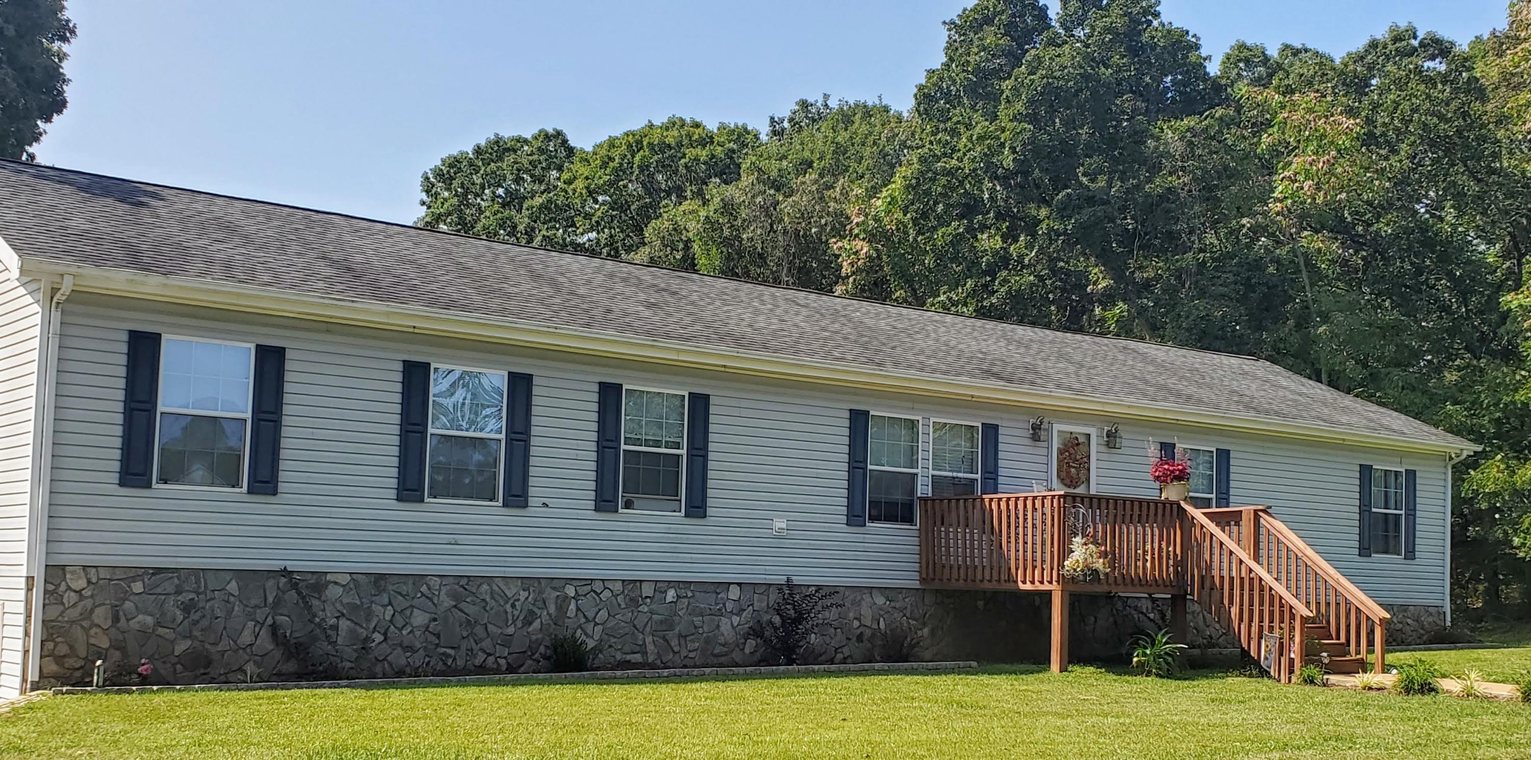 160 Northridge Road Hardy, VA 24101 - Photo 1 of 42 a front view of a house with a yard