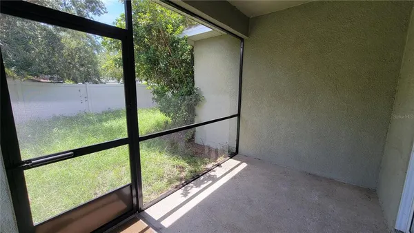 a view of a room with a large window
