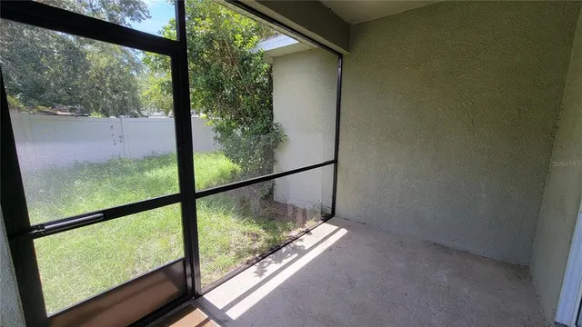 a view of a room with a large window