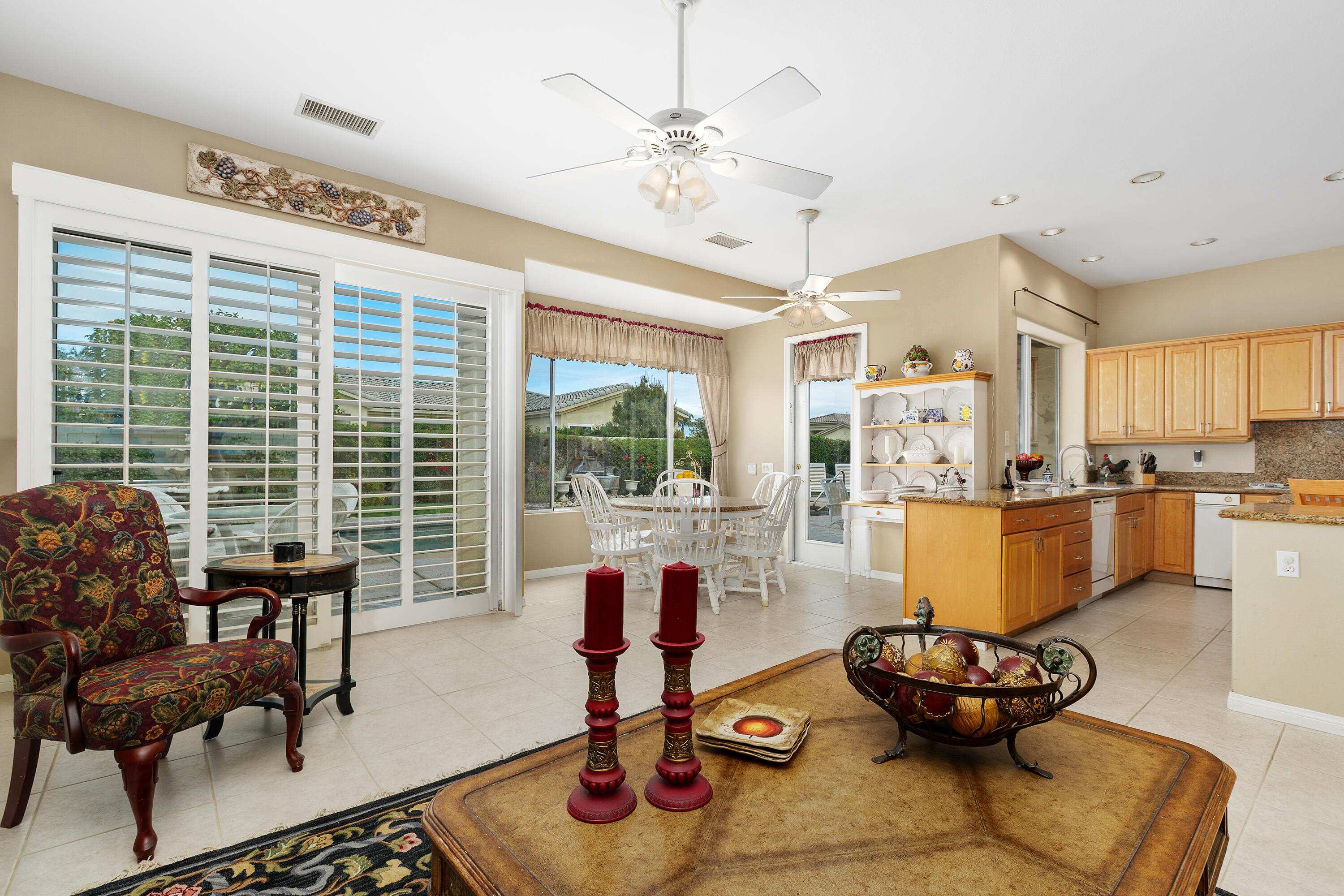 2 Othello Court Rancho Mirage, CA 92270 - Photo 14 of 45 a living room with furniture and a large window