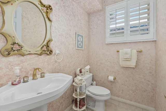 a bedroom with furniture and a book shelf