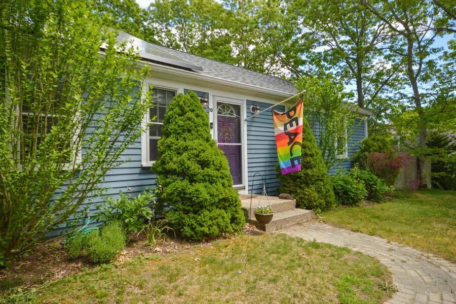 10 Meredith Road Forestdale, MA 02644 - Photo 24 of 29 a view of a house with potted plants and a large tree