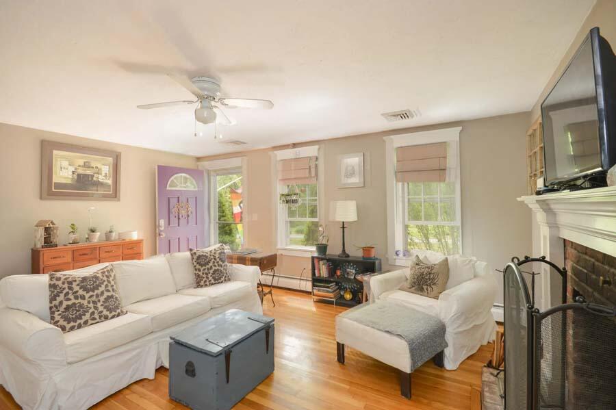 10 Meredith Road Forestdale, MA 02644 - Photo 5 of 29 a living room with fireplace furniture and a flat screen tv
