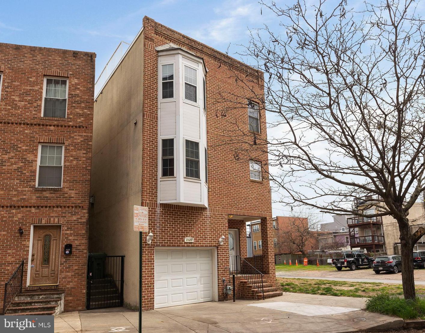 a front view of a building with street