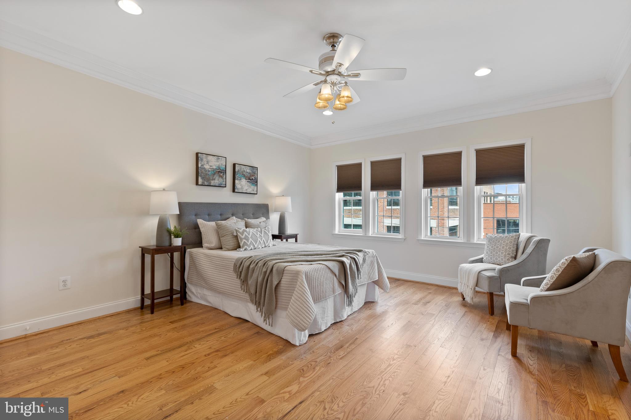 1125 Race Street Baltimore, MD 21230 - Photo 18 of 43 a spacious bedroom with a bed and wooden floor
