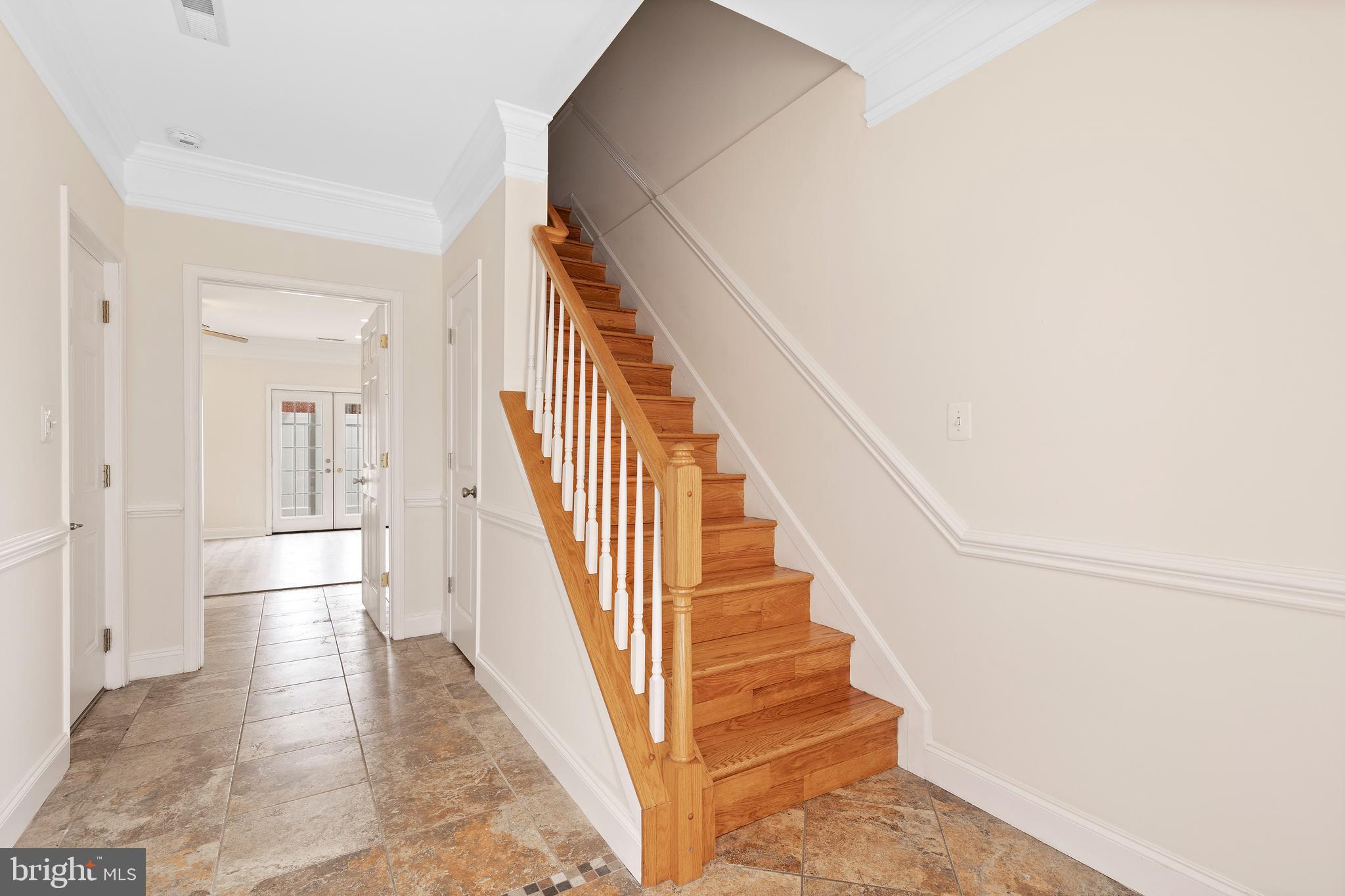 1125 Race Street Baltimore, MD 21230 - Photo 36 of 43 a view of staircase with white walls and white walls
