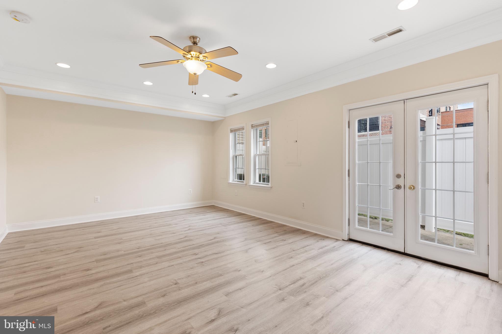 1125 Race Street Baltimore, MD 21230 - Photo 39 of 43 wooden floor in an empty room with a window