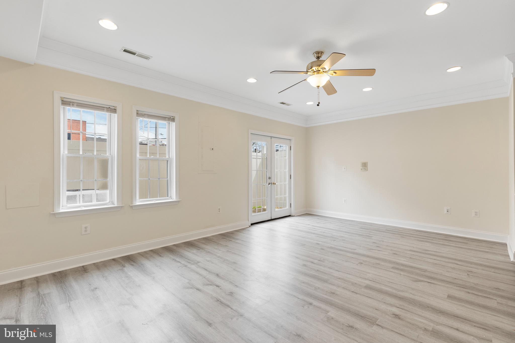 1125 Race Street Baltimore, MD 21230 - Photo 40 of 43 wooden floor in an empty room with a window