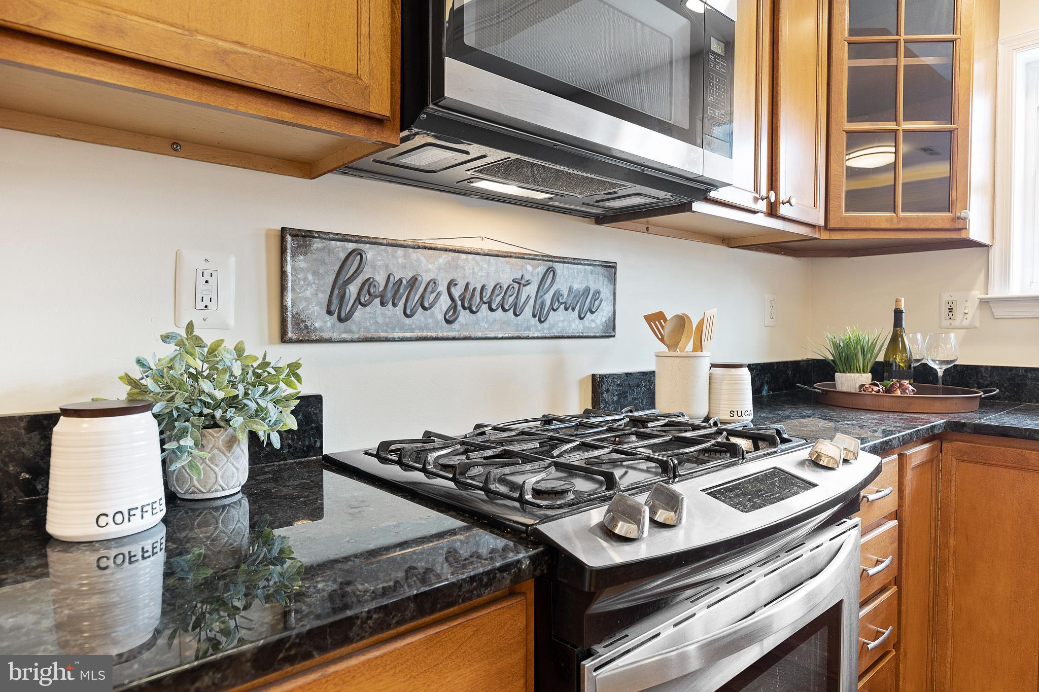 1125 Race Street Baltimore, MD 21230 - Photo 7 of 43 a white stove top oven sitting inside of a kitchen