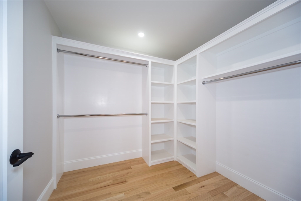 57 Beverly Road Natick, MA 01760 - Photo 14 of 20 a view of an empty walk in closet