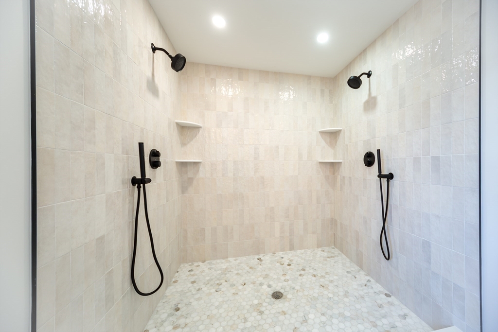 57 Beverly Road Natick, MA 01760 - Photo 17 of 20 a bathroom with a shower