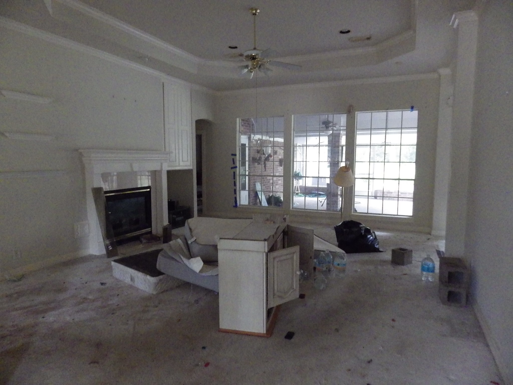 12 Robin Trail Conroe, TX 77304 - Photo 11 of 16 family room with gas fireplace
