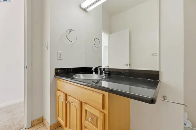 a view of balcony with furniture and wooden floor