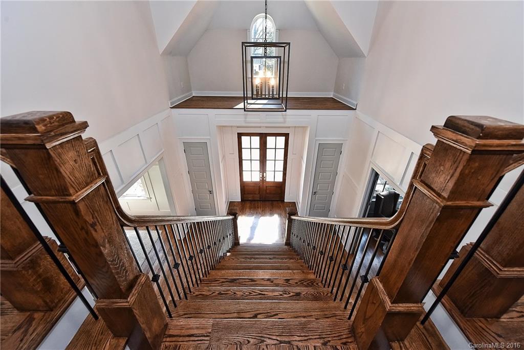 2308 Vernon Drive Charlotte, NC 28211 - Photo 20 of 24 a view of staircase with railing and frames on wall