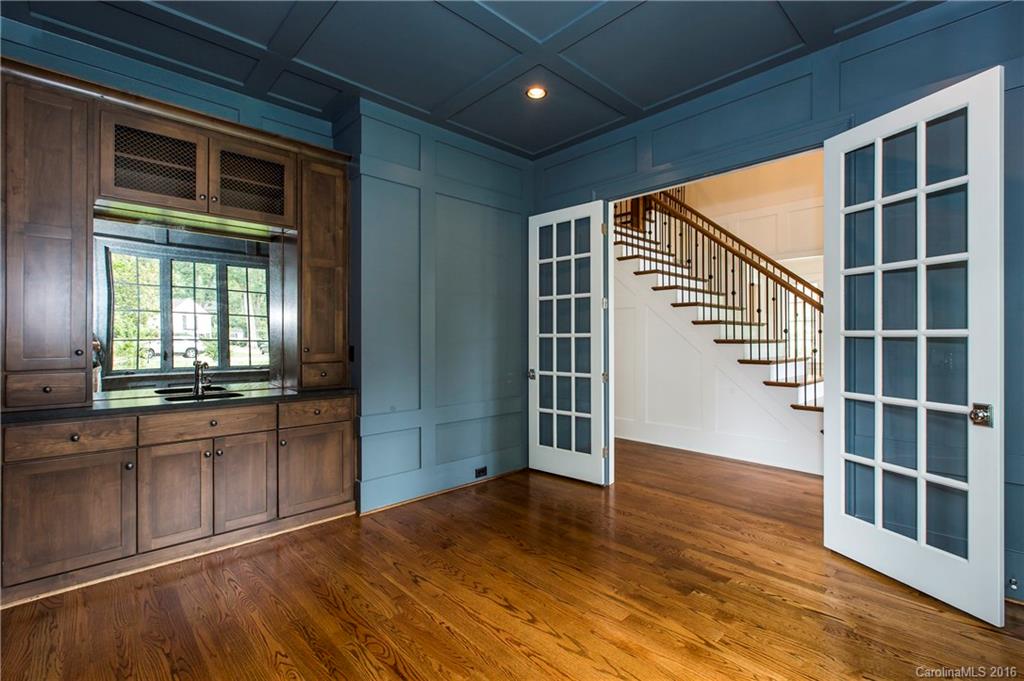 2308 Vernon Drive Charlotte, NC 28211 - Photo 5 of 24 a view of empty room with wooden floor and windows
