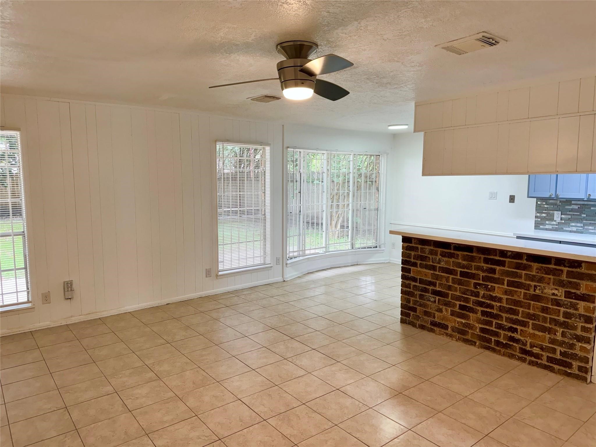 7015 Pyron Way Houston, TX 77036 - Photo 3 of 12 a bathroom with a sink and a shower
