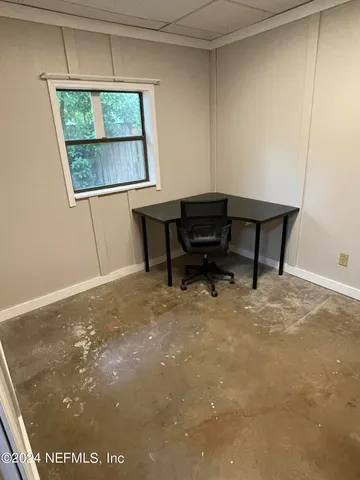 a room with furniture and a window