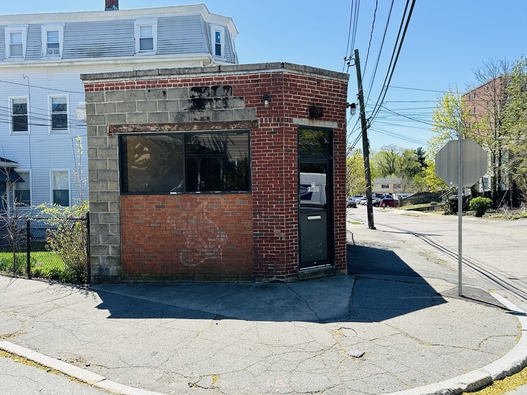 77 Forest Street Watertown, MA 02472 - Photo 4 of 10 a front view of a building with street